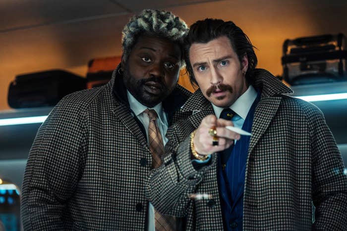 Brian Tyree Henry and Aaron Taylor-Johnson on a train