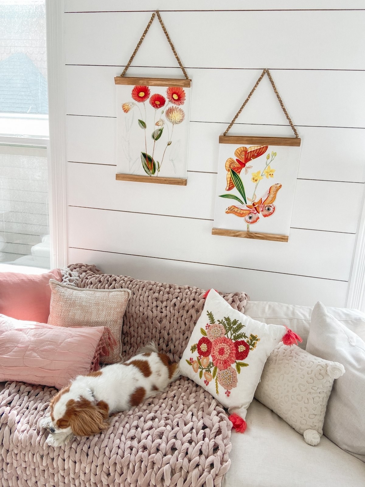beaded hangers with floral prints on the wall