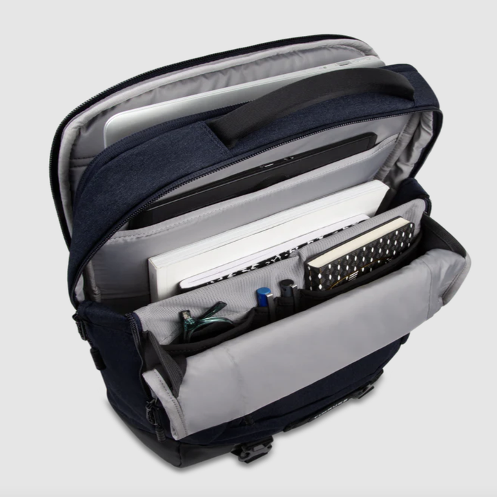 inside of backpack showing laptop sleeve and various pockets