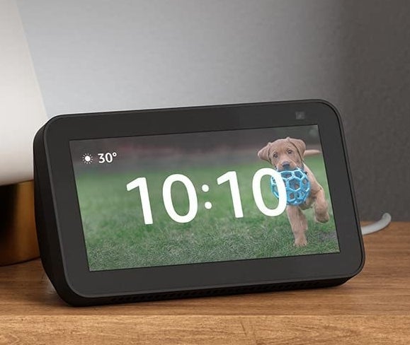 an echo show on a wood surface