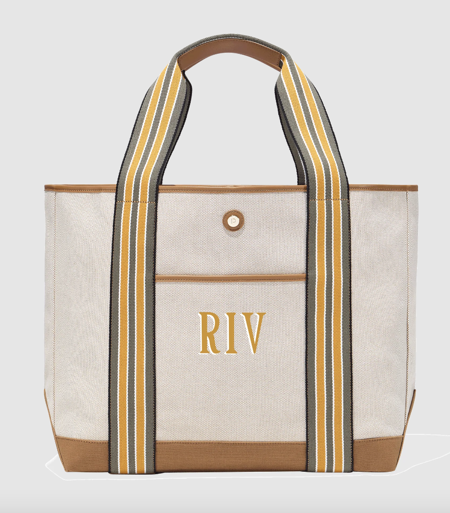 large canvas tote with yellow striped handles and the initials &quot;RIV&quot;
