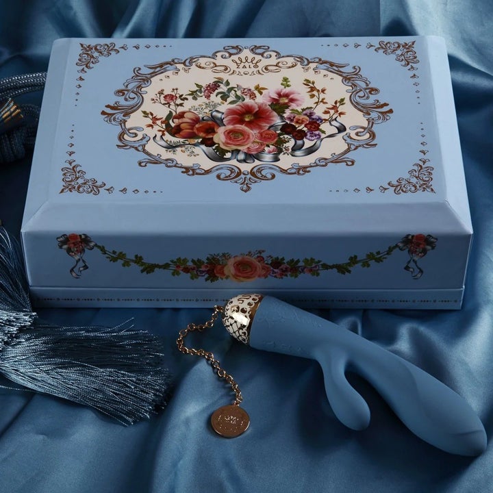 Blue rabbit vibrator next to ornate box
