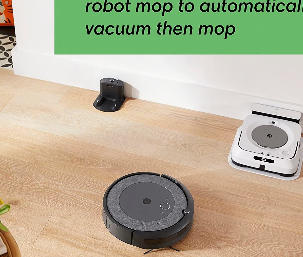 the roomba zooming around a living room