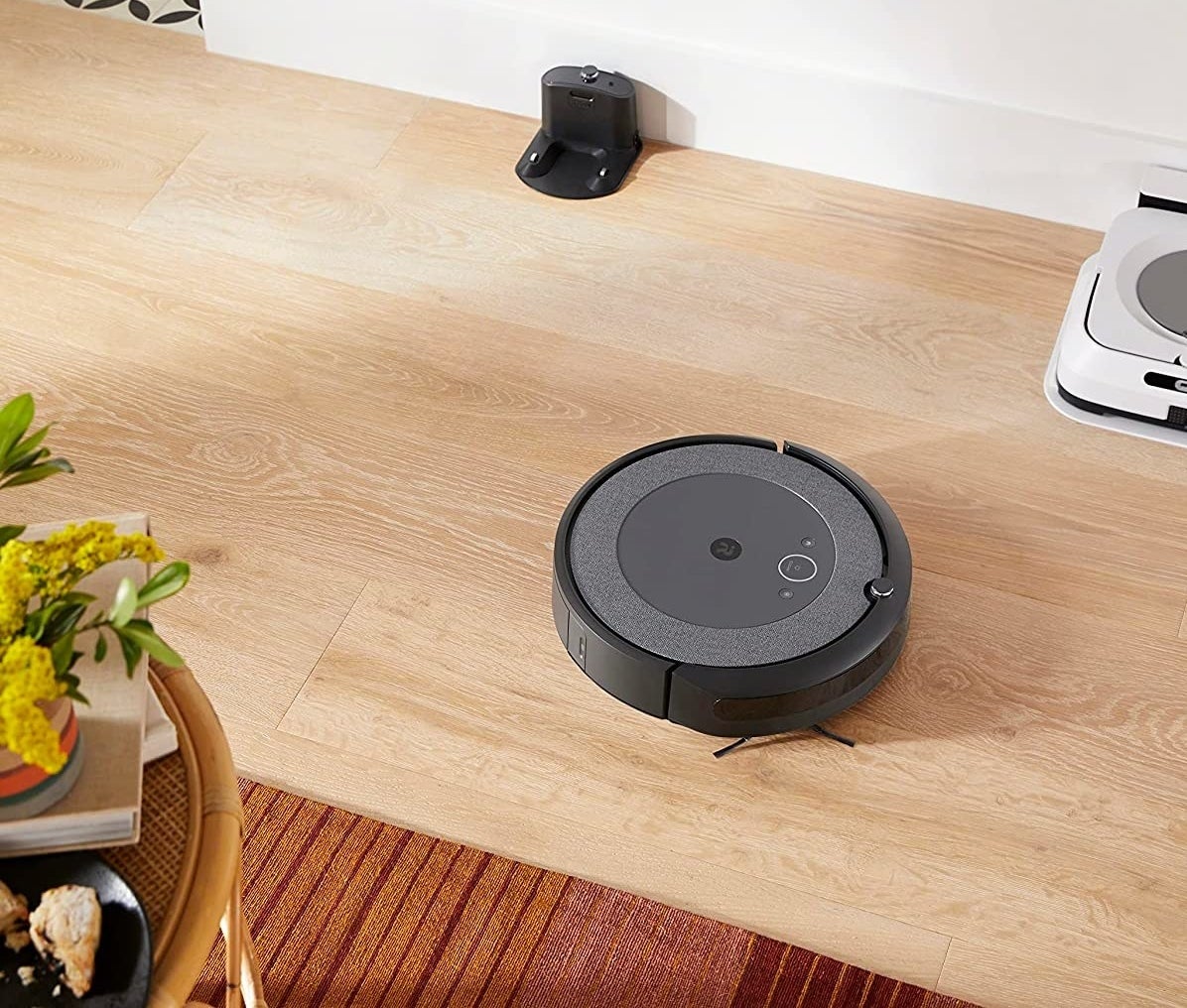 the roomba zooming around a living room