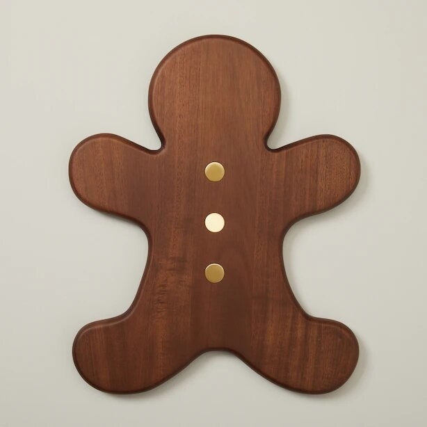 the gingerbread serving board against a plain surface