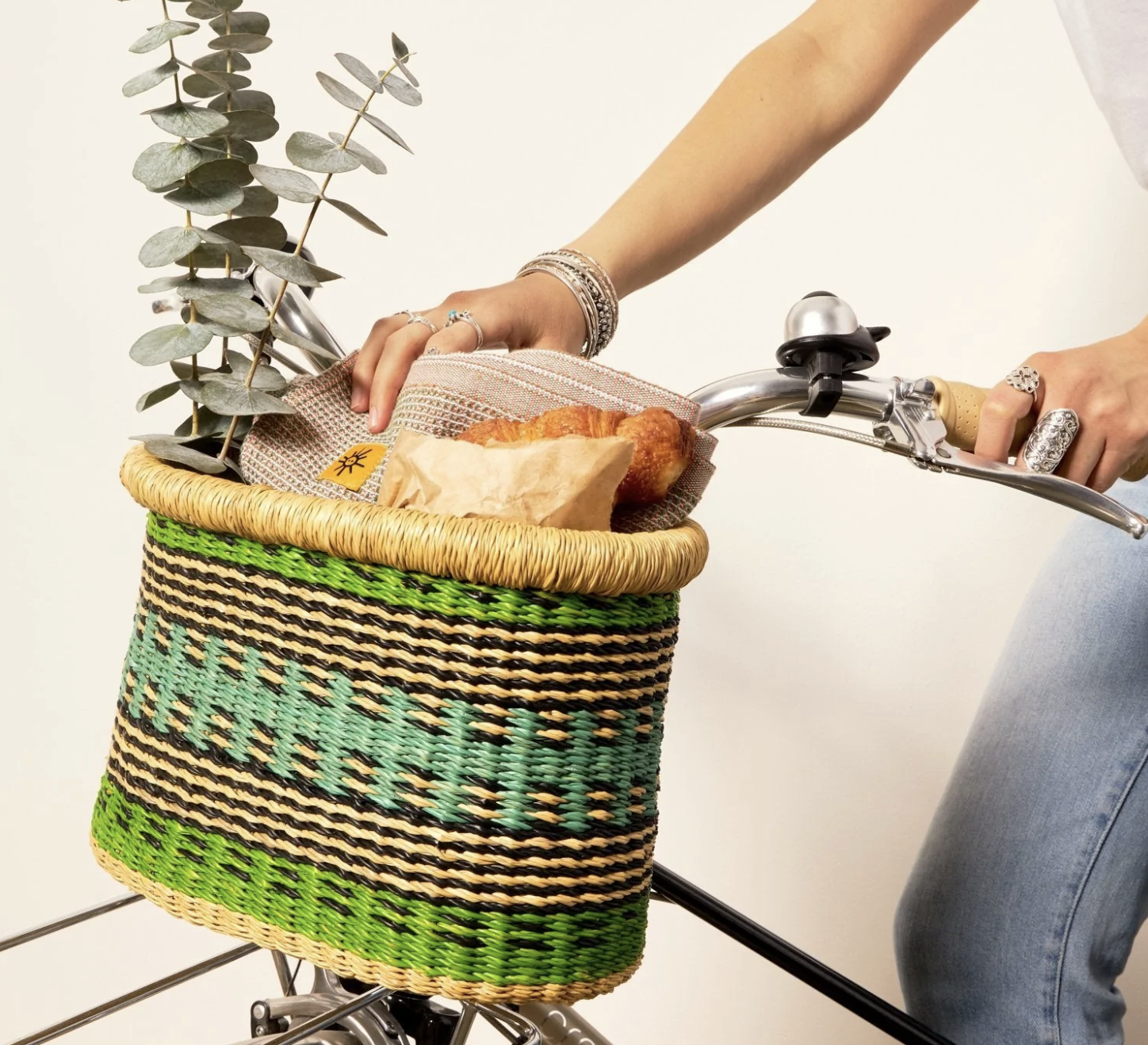 woven basket on bike handlebars