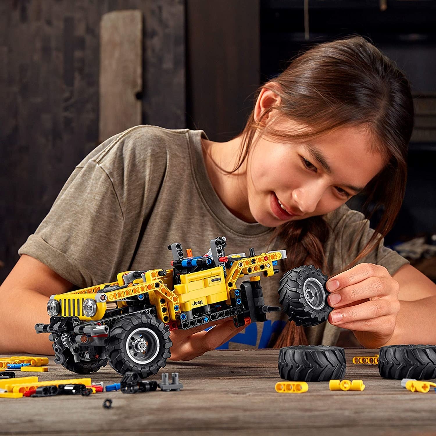 a person building their Jeep lego set