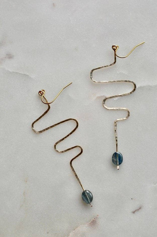 squiggle earrings with gem detail at bottom