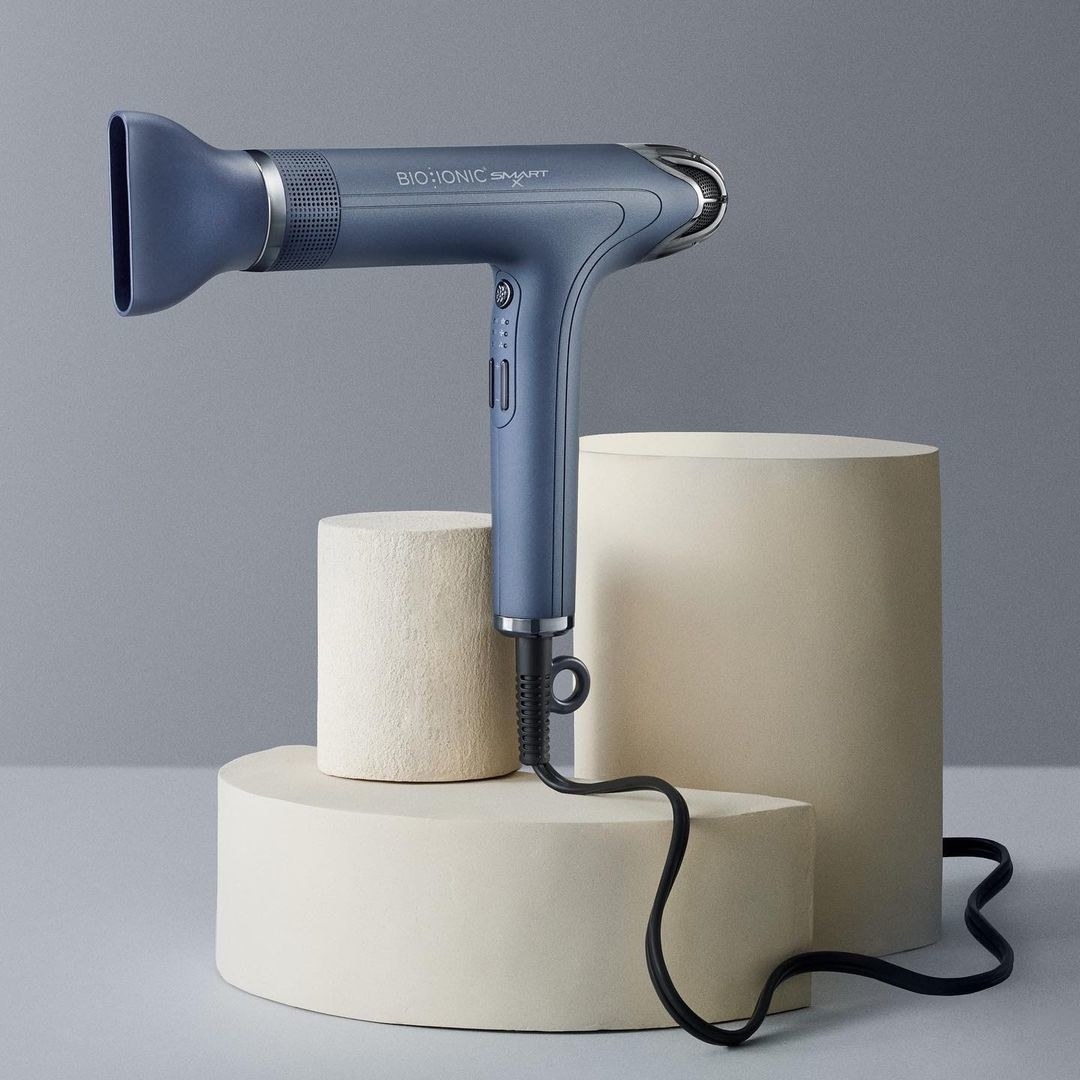 the slim ionic hair dryer on cylindrical sculptures