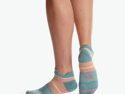 model wearing bombas running socks