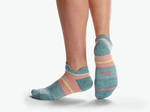 model wearing bombas running socks