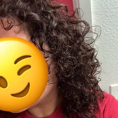 reviewer with curly hair