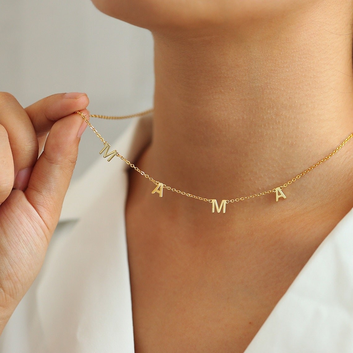 a necklace that says &quot;mama&quot;