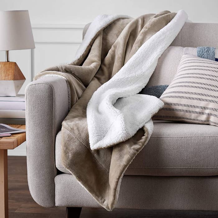 A throw blanket draped over a couch