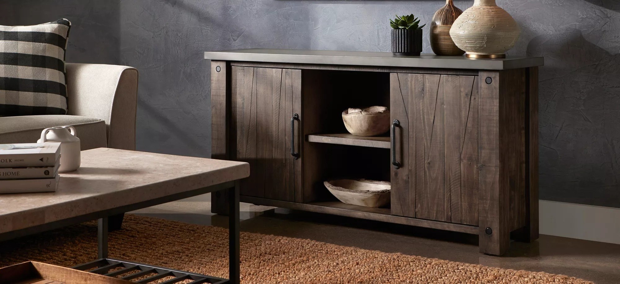 a brown wood horizontal console table with a door at either end and open shelves in the middle