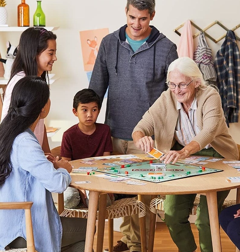 a family playing the game at a table
