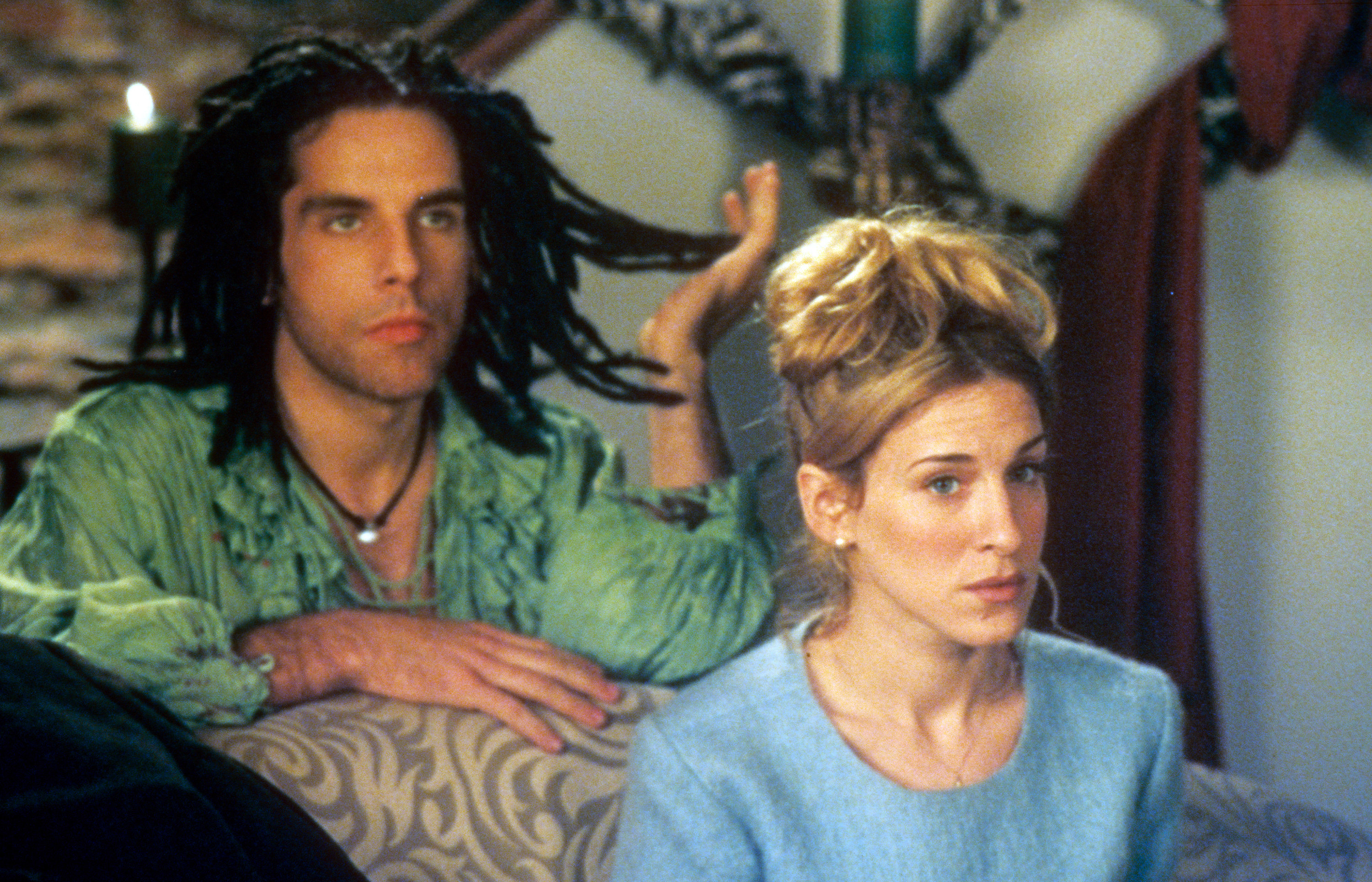 Ben Stiller kneeling behind Sarah Jessica Parker as he pulls at some of the dreadlocks on his head in a scene from the film &#x27;If Lucy Fell&#x27;