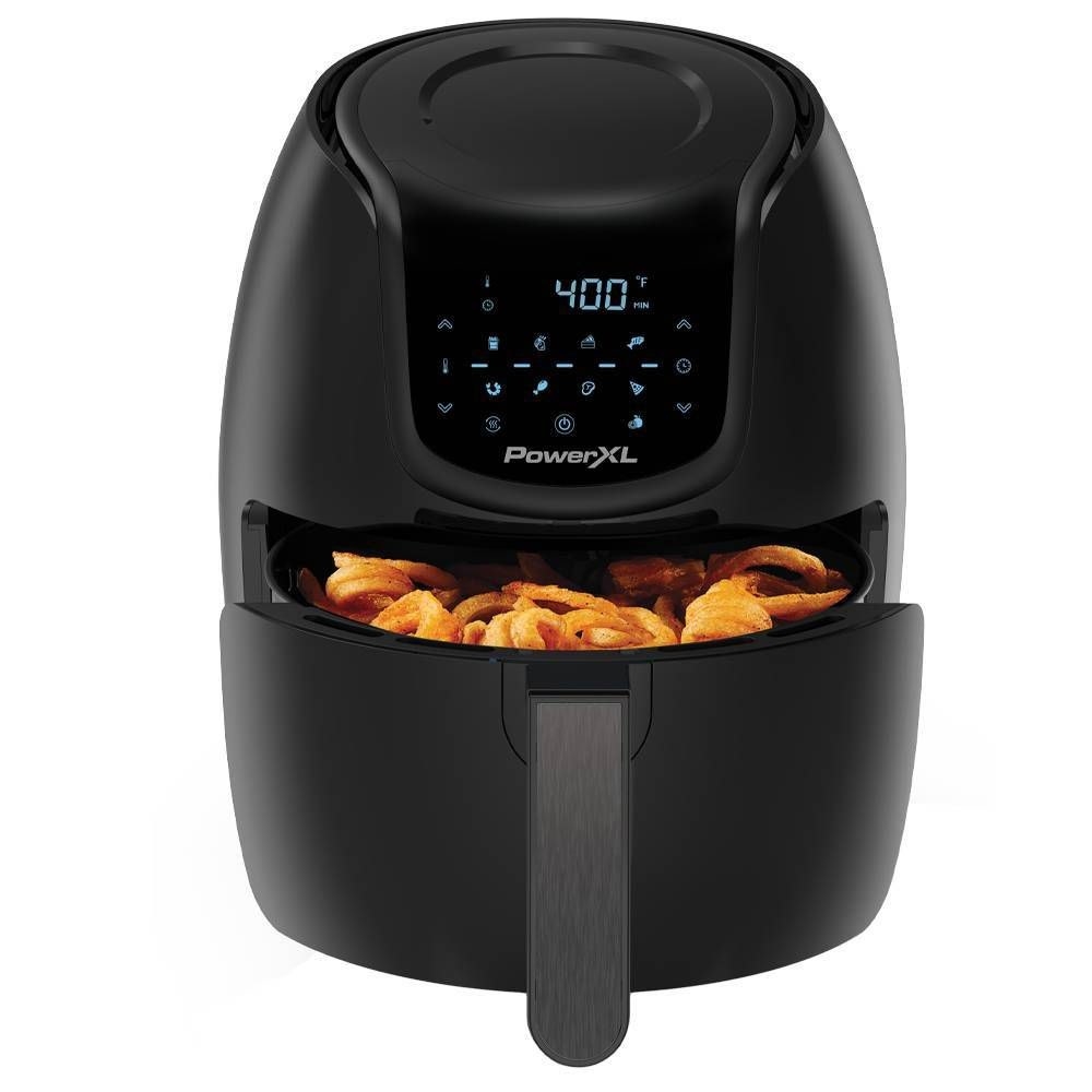 the air fryer with food in the basket