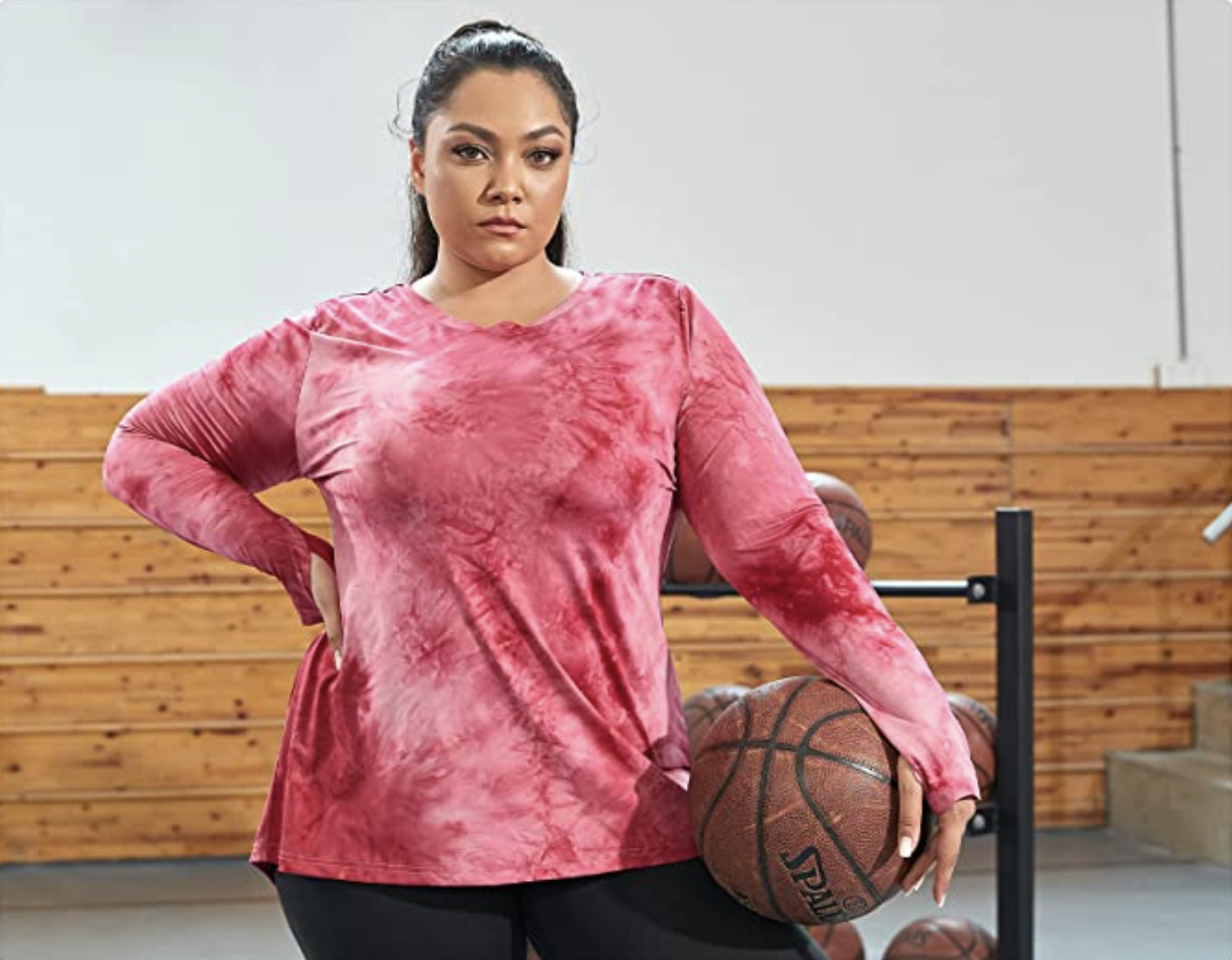 a model wearing the top in red tie dye