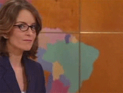 a gif of tina fey and amy poehler leaning their heads together and saying you&#x27;re welcome in unison