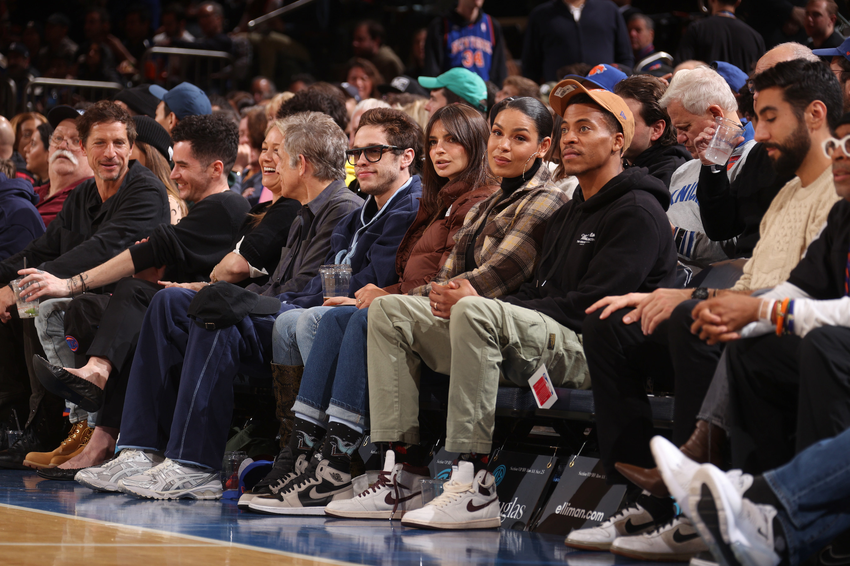 Pete and Emily sitting together at the Knicks game