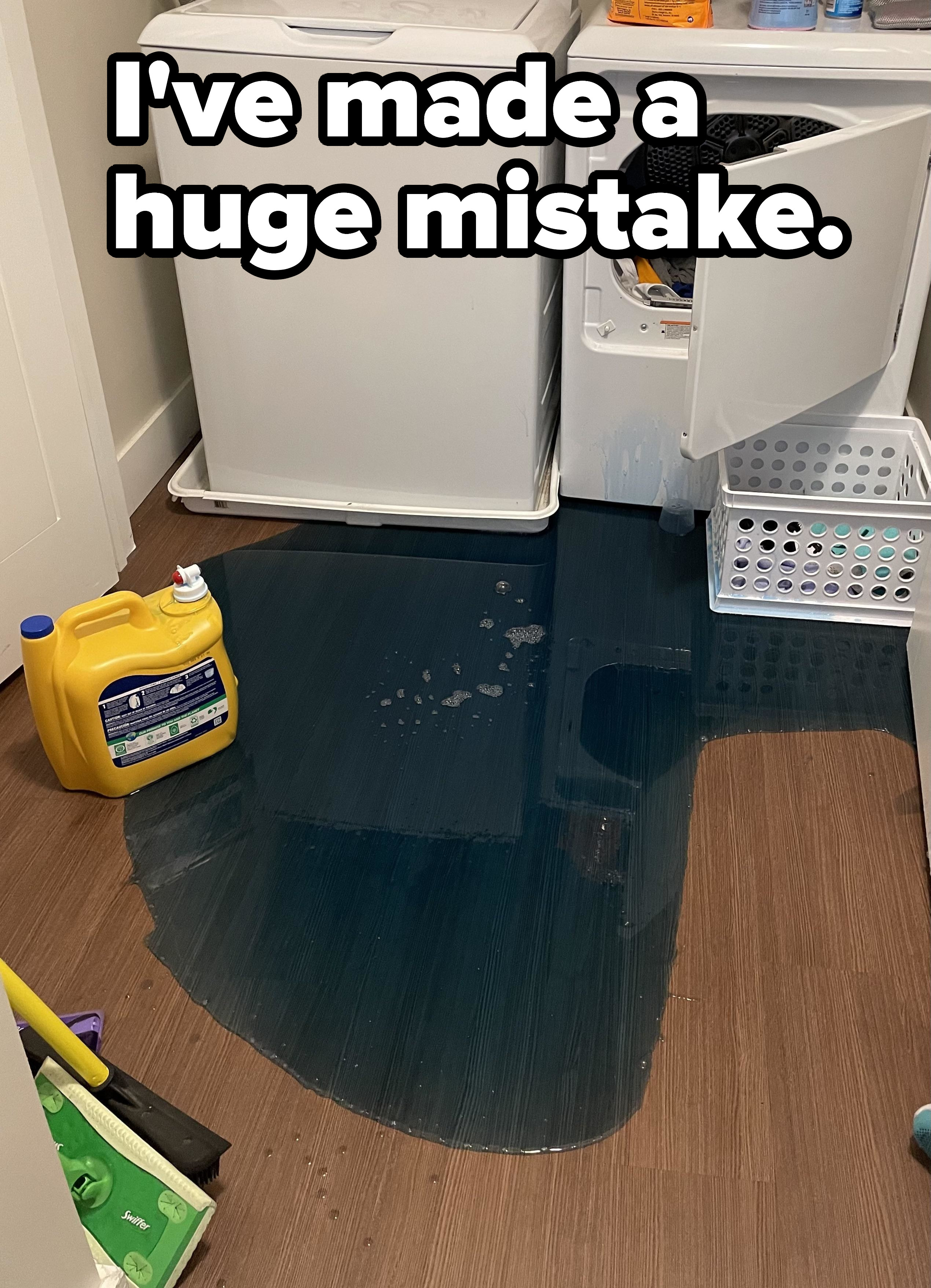 Person who spilled liquid detergent from a large container all over the floor in front of the washing machine, with the caption &quot;I&#x27;ve made a huge mistake&quot;