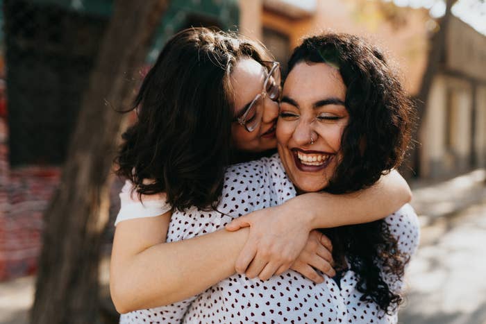 A lesbian couple showing affection