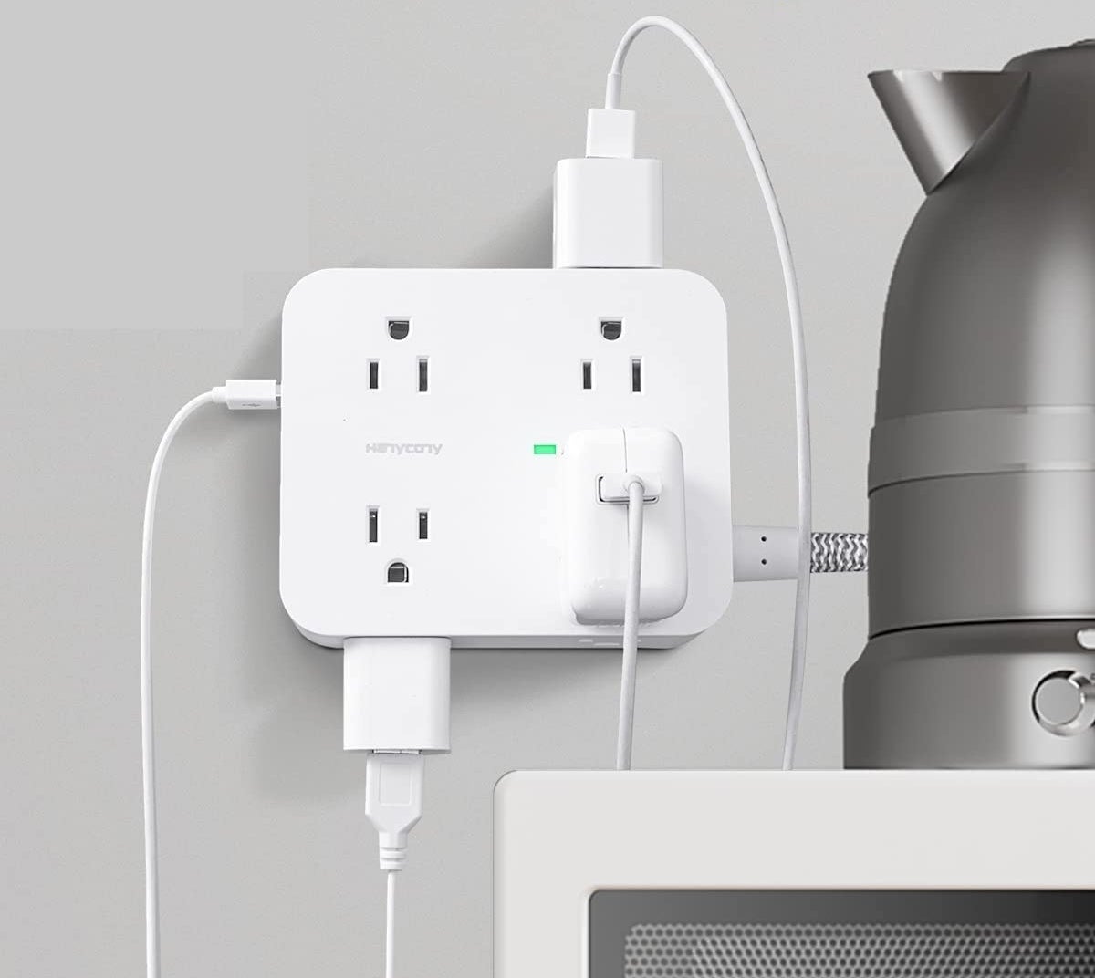 the three-sided surge protected power bar plugged into a wall