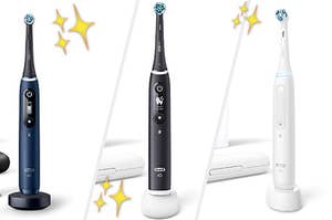 Three Oral-B toothbrushes