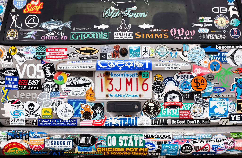 A car covered in bumper stickers