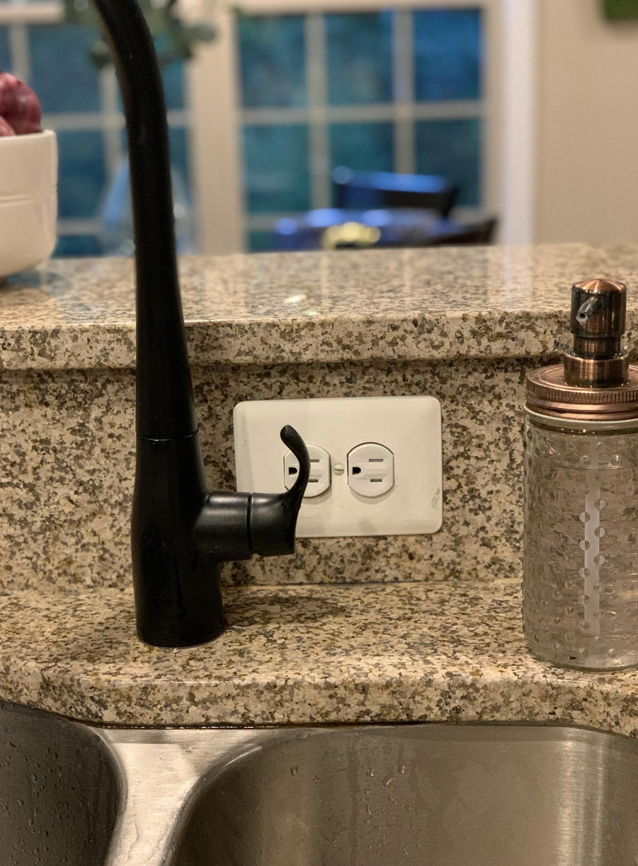 outlet right behind the kitchen faucet