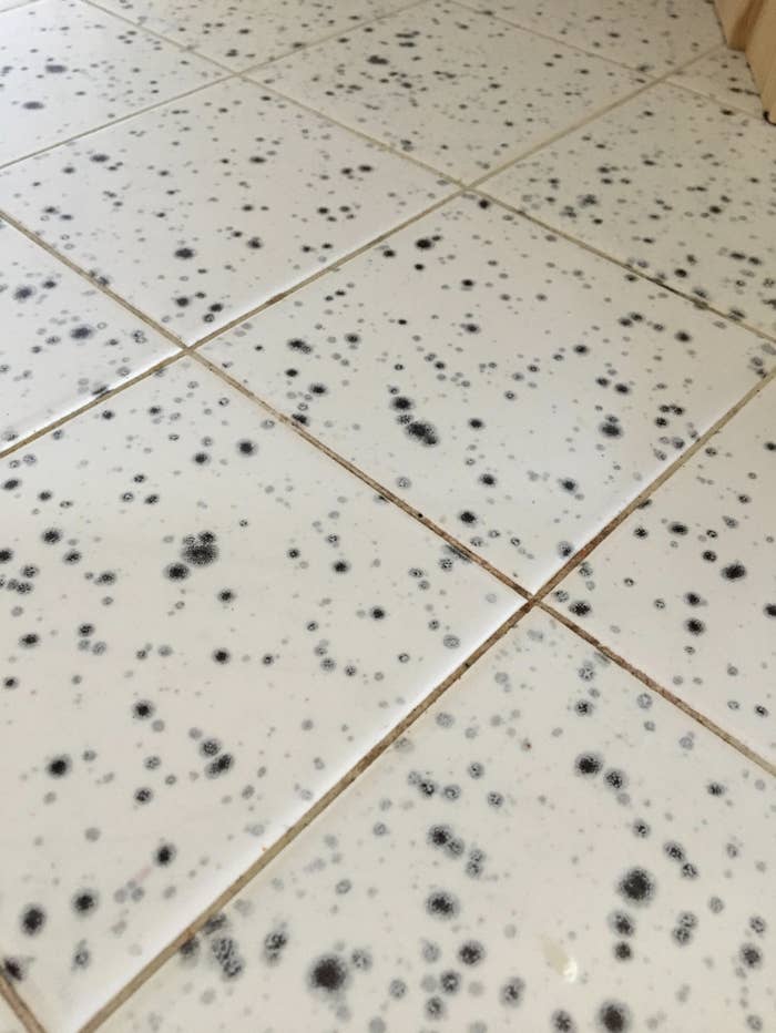 dark spots covering the tile