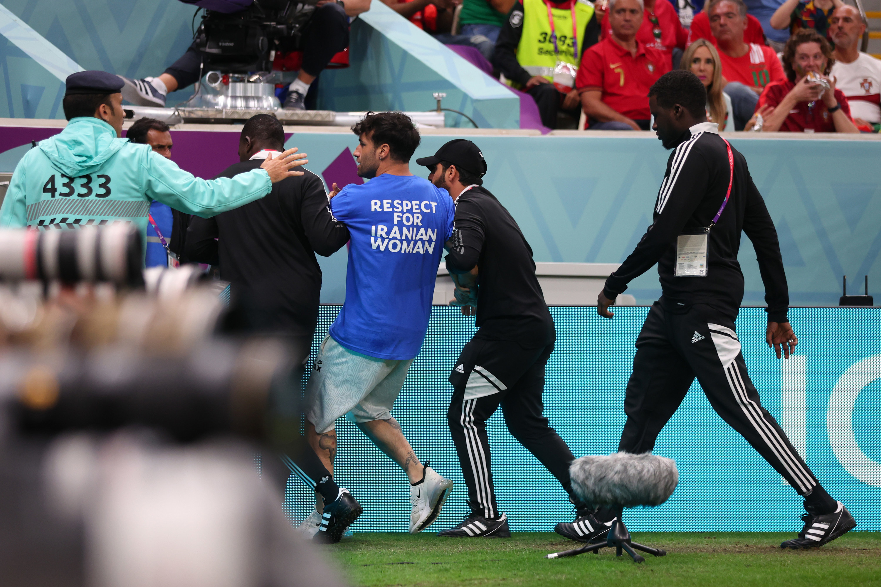 Respect For Iranian Women' protester invades pitch at World Cup