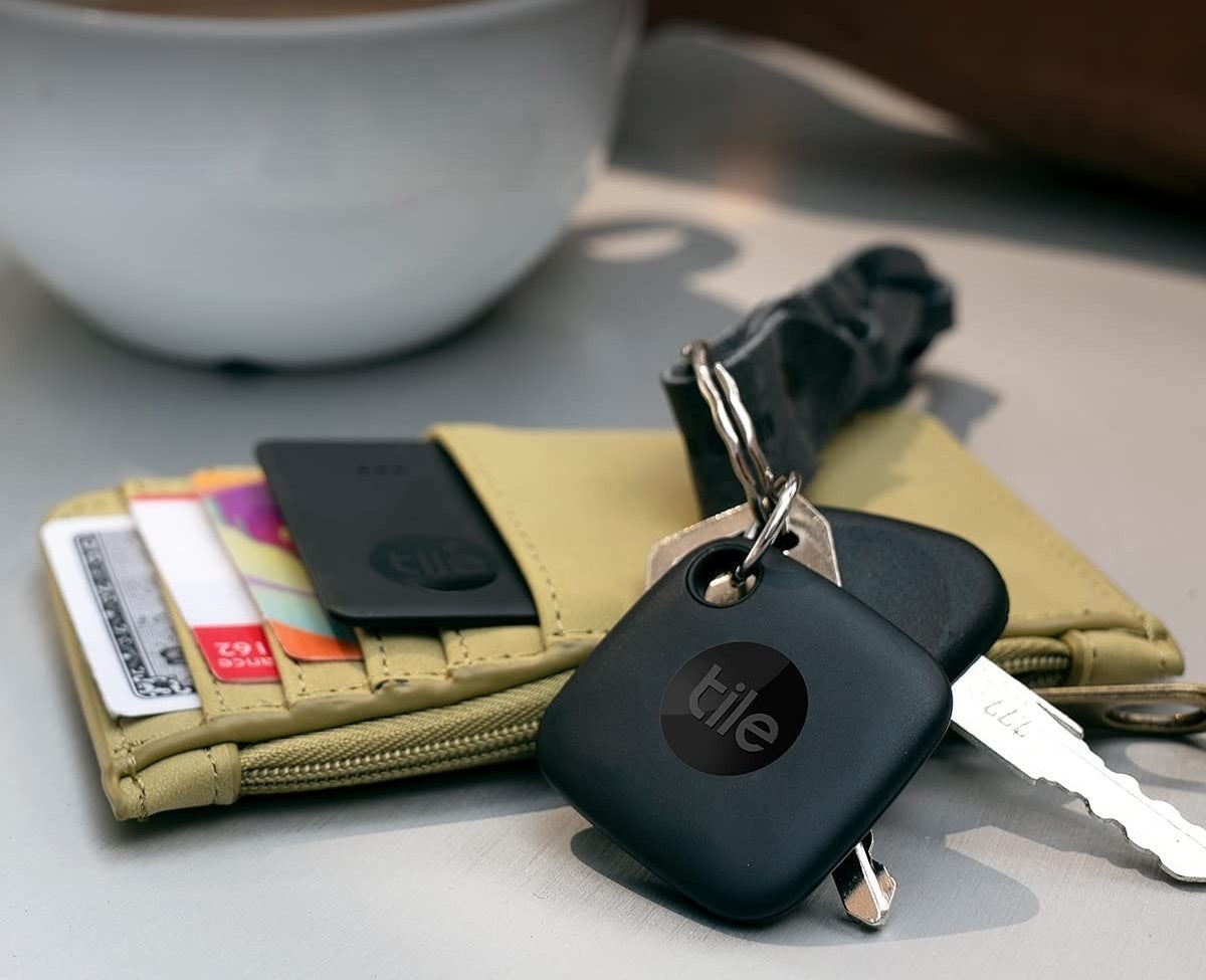 the tile slim in a wallet and the tile keychain on a set of keys