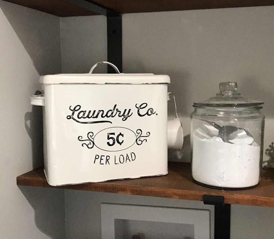 the laundry bin above a reviewer&#x27;s washing machine