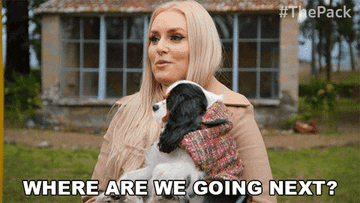 GIF of Lindsey Vonn in The Pack holding puppy and saying, &quot;Where are we going next?&quot;