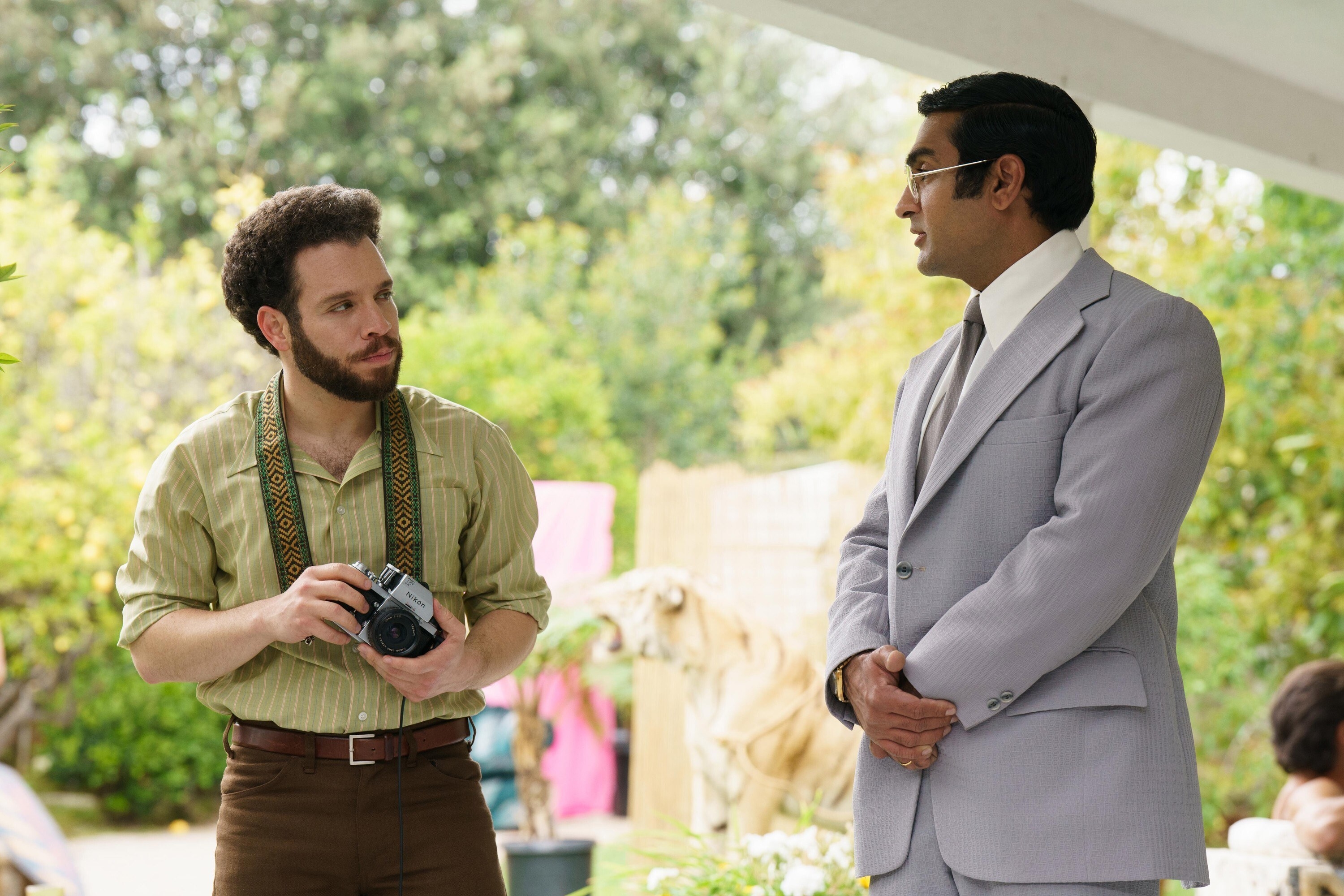 WELCOME TO CHIPPENDALES, from left: Robin de Jesus as Ray Colon, Kumail Nanjiani as Somen &#x27;Steve&#x27; Banerjee, (Season 1, ep. 103, aired Nov. 29, 2022)