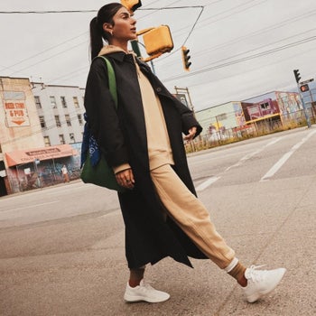 model in white sneakers