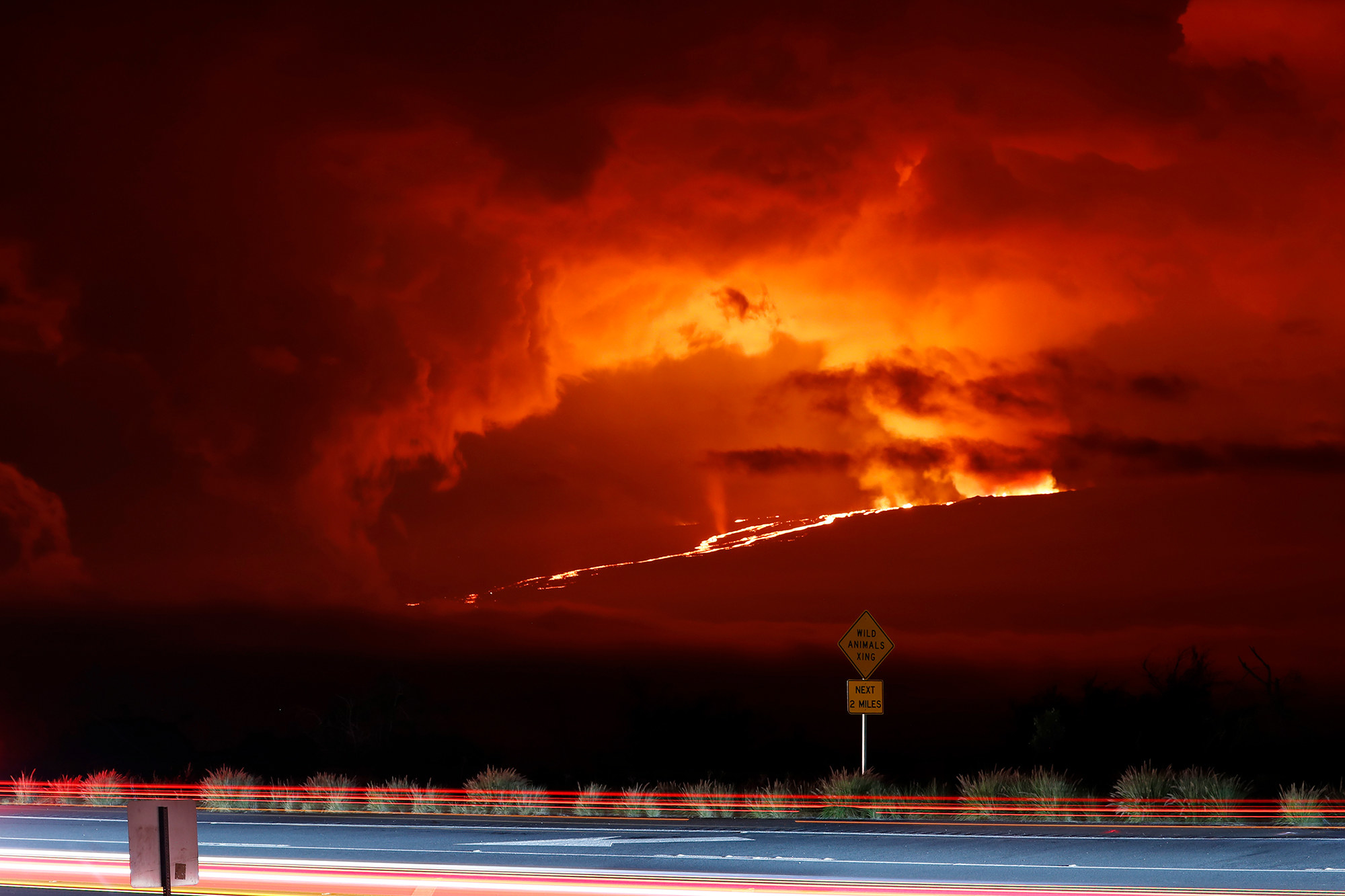 An image of Hawaii&#x27;s Mauna Loa volcano erupting