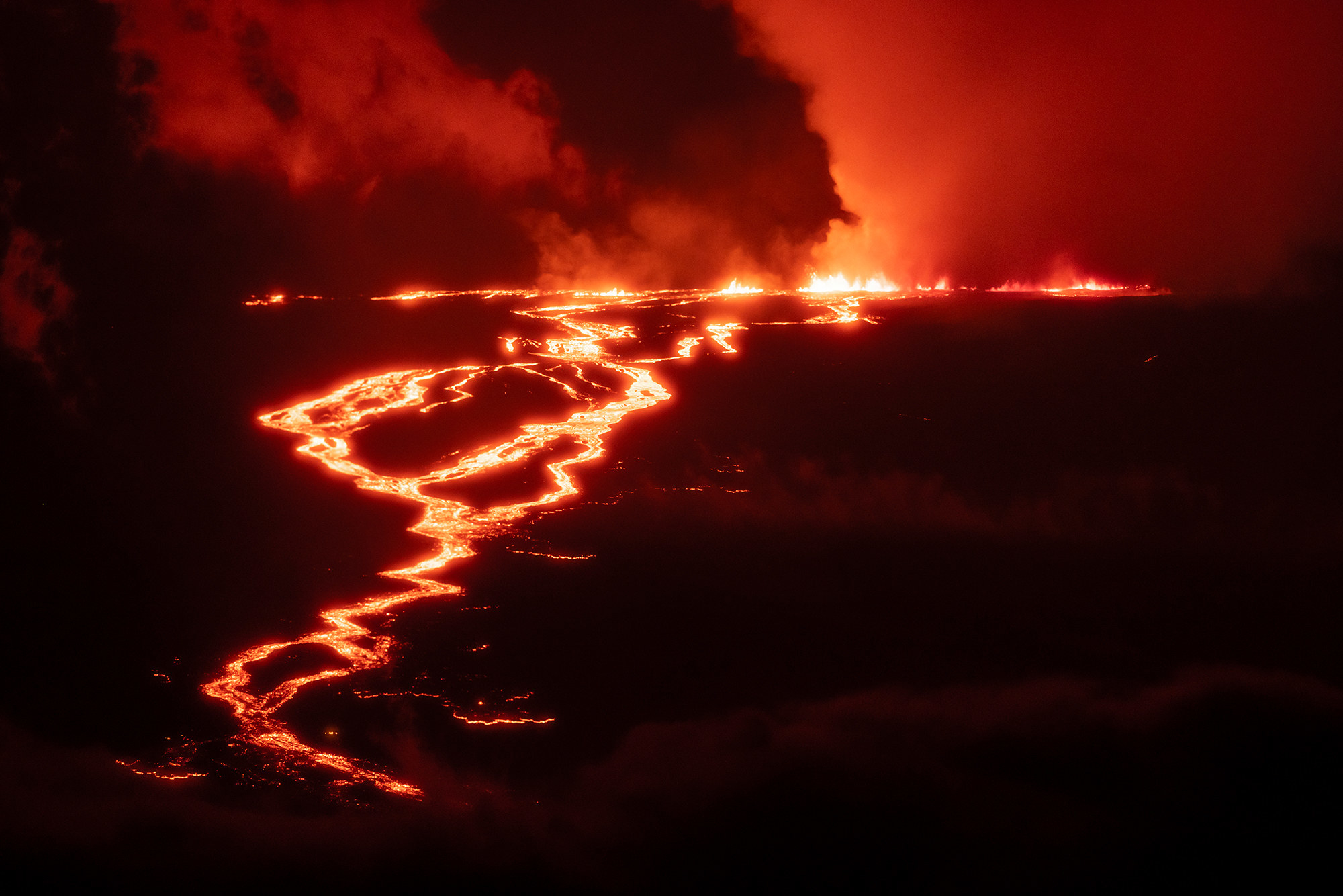 An image of Hawaii&#x27;s Mauna Loa volcano erupting