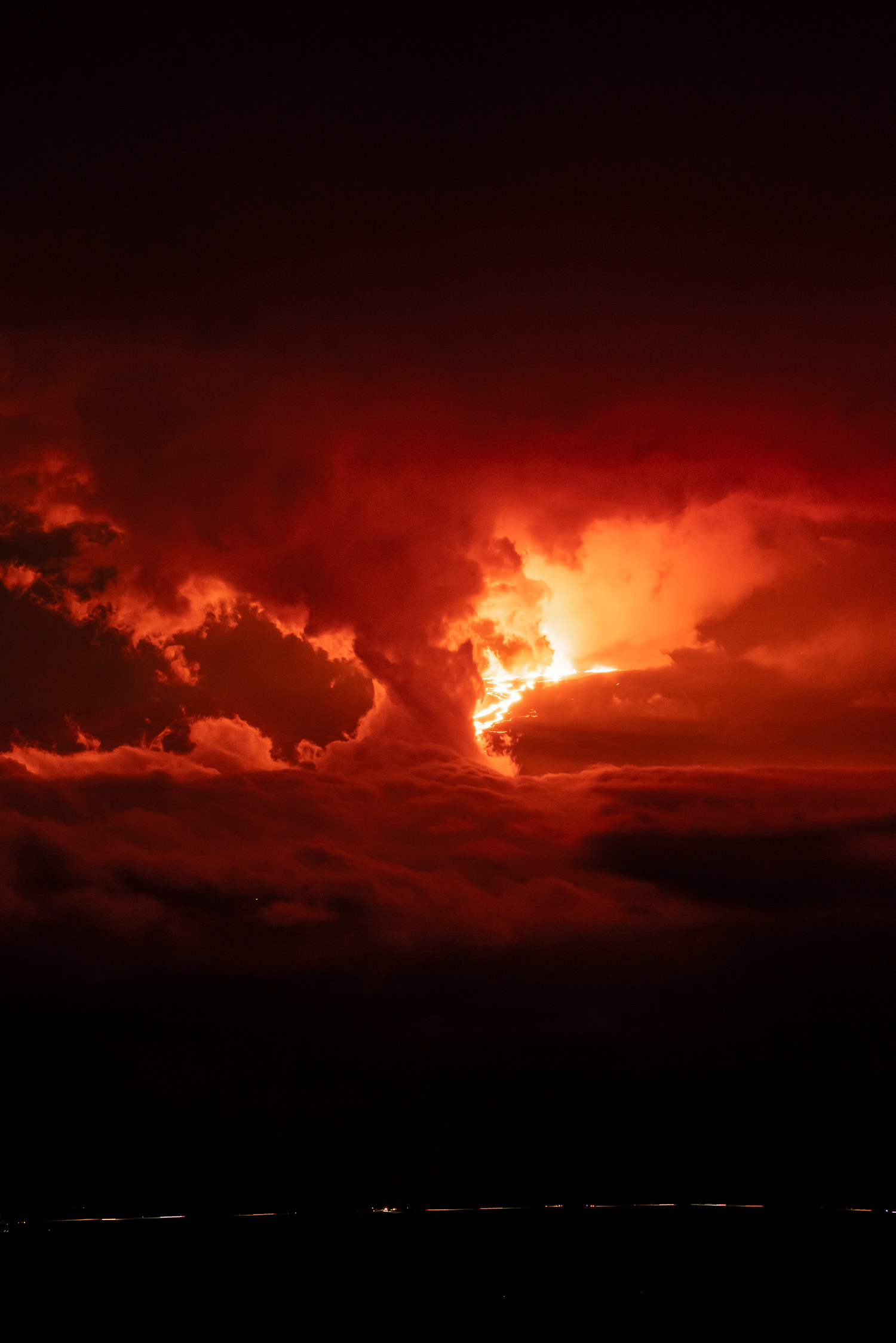 An image of Hawaii&#x27;s Mauna Loa volcano erupting