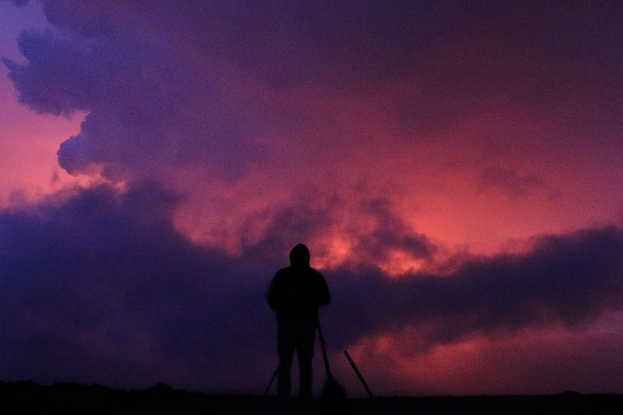 An image of Hawaii&#x27;s Mauna Loa volcano erupting