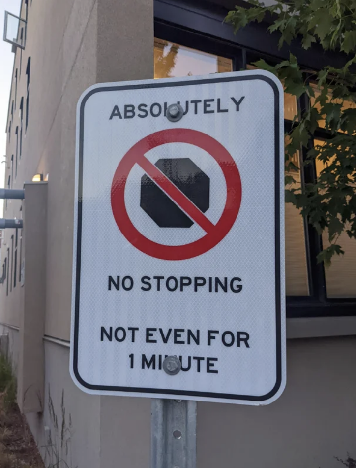 Sign says, No stopping, not even for 1 minute