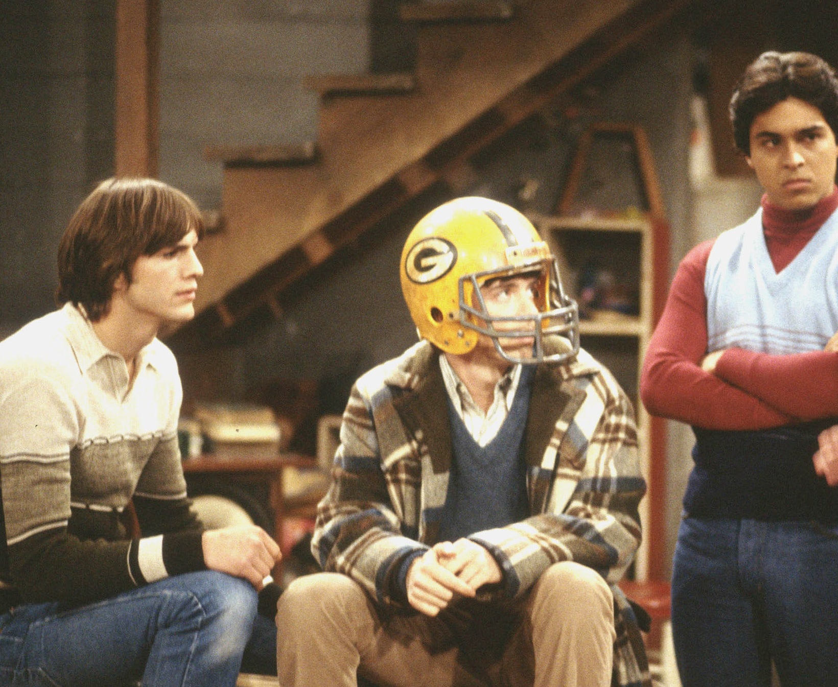 Kelso, Eric, and Fez in a basement