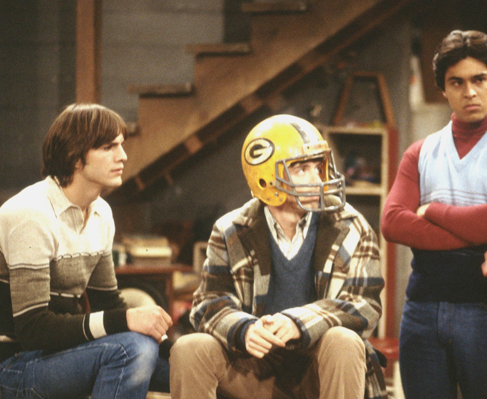 Kelso, Eric, and Fez in a basement