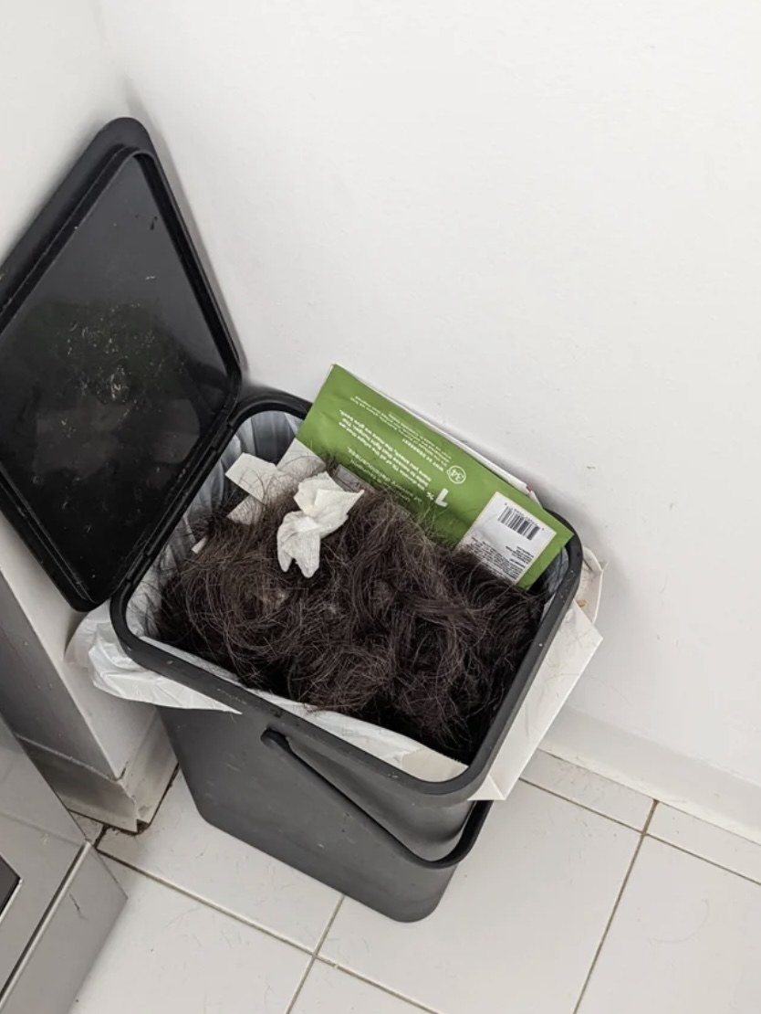 A trash full of hair