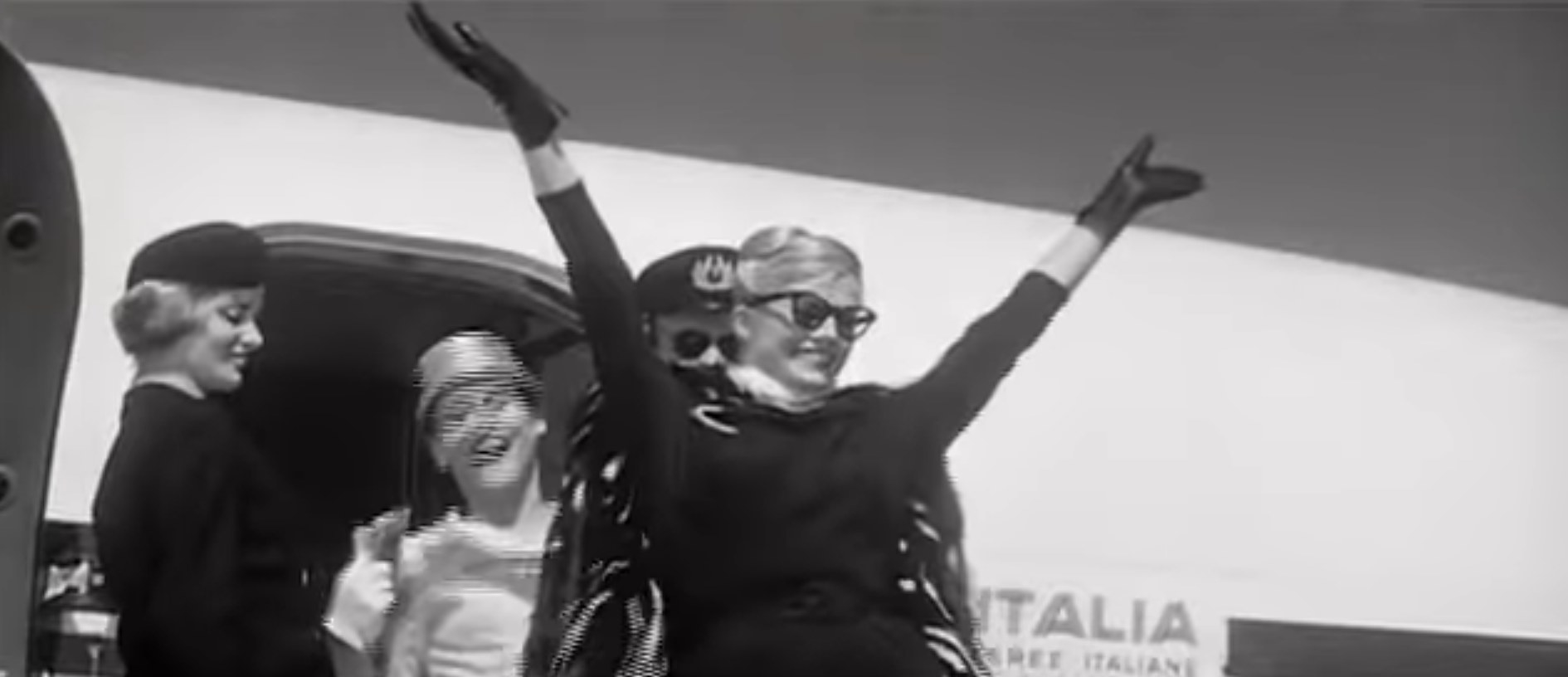 Anita Ekberg steps off a plane in La Dolce Vita