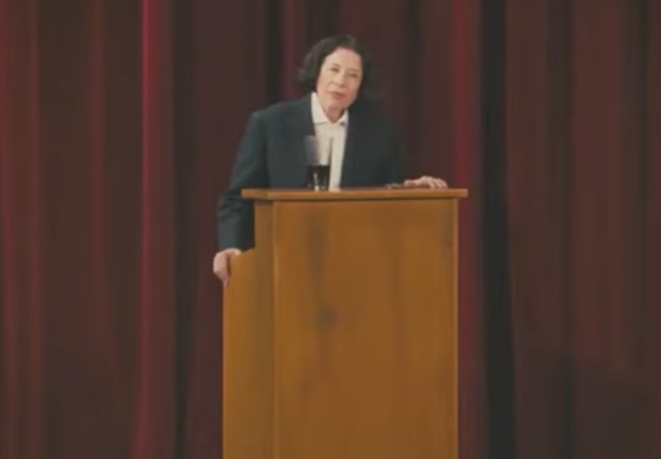 Fran Lebowitz speaks at a podium