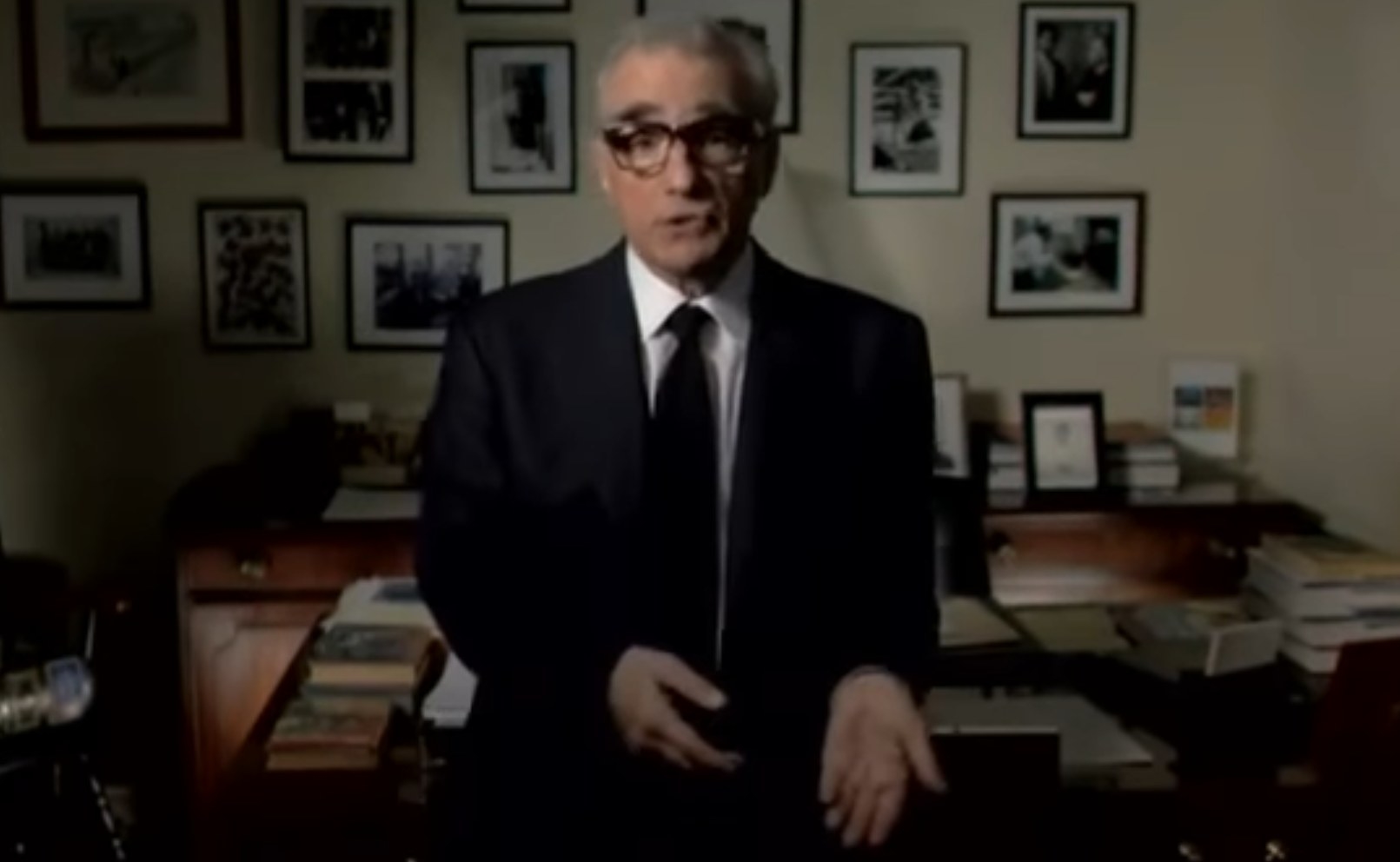 Martin Scorsese talks to the camera in an office