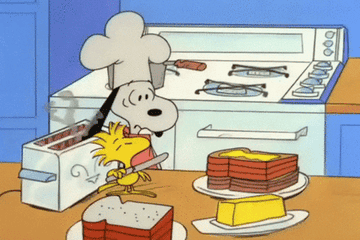 Snoopy and Woodstock buttering bread
